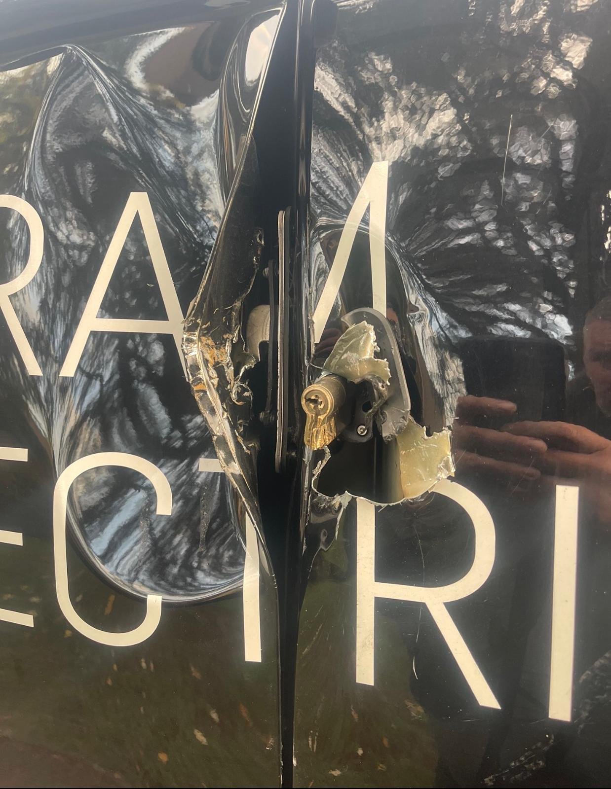 Van rear door lock forced and damaged before repair